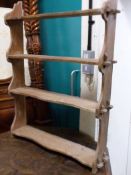 A pine Arts and Crafts wallshelf (W77, D15,