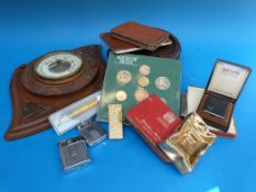 A collection of lighters, smoking related items,