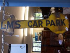 An enamel LMS arrow-shaped car park sign (91cm long)