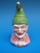 A late 19th/20thC Royal Worcester candle snuffer of Punch