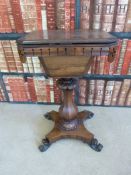 A 19thC rosewood sewing table with octagonal baluster-shaped column (W43cm, D37cm,