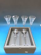 A set of 12 Waterford Crystal Millennium Collection toasting flutes / wine glasses in the Peace