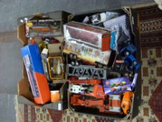 A collection of large scale model vehicles some battery operated.