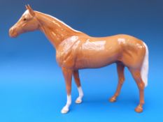 A large Beswick racehorse,