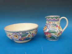 A Poole Pottery hand-decorated jug and bowl,