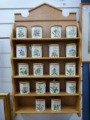 A Portmeirion herb and spice rack with 18 spice jars