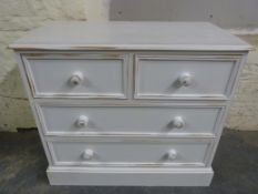 A distressed pine chest of two over two drawers (W91, D46,