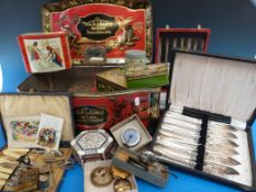 A quantity of plated cased cutlery, collectable tins,
