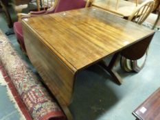 A drop leaf dining or sofa table with unusual flap mechanism (max L150cm, min 82cm, W75cm,