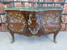 A Louis XV style kingwood parquetry inlaid bombe chest of two drawers with shaped and stepped front