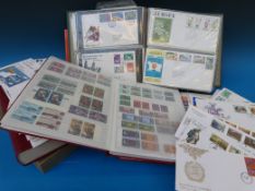 Two stockbooks of mint and used GB stamps, a stockbook of mint Channel Island stamps,