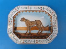 A Chinese octagonal platter with hand-painted decoration of a cheetah to the centre (32 x 25cm)