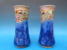 A pair of Royal Doulton vases decorated with fruit, decorator's mark for Lily Partington (24.