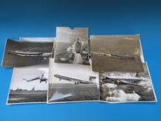 Nine photographs of the Cunard liners RMS Queen Mary and RMS Queen Elizabeth together with a