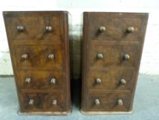 A pair of bedside cabinets formed as chest of drawers