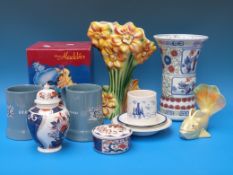 A collection of various ceramics to include Kalmar vase Wade tankards, Schmid Disney Aladdin globe,