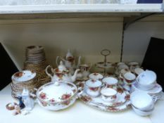 A collection of Royal Albert Old Country Roses dinner and tea ware (approximately 90 pieces) and