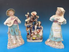 A pair of Heubach figures of musicians (32cm tall) and a Staffordshire flatback spill case 'The