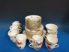 A Royal Doulton part teaset hand-decorated with exotic birds (H1422 and Doulton stamp to base)