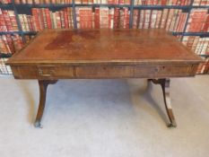 A 19th century style mahogany leather inset library table with three drawers to one side and false