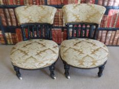 A pair of late 19thC ebonised and gilt parlour chairs in the manner of Shoolbred