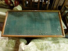 An oak framed notice board with label verso dated 1935 and Bethnal Green Hospital on label (L122cm)