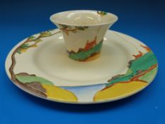 A Clarice Cliff teaplate and flared sugar bowl,