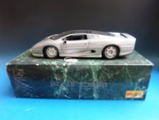 A Maisto 1:12 scale diecast model Jaguar XC220,
