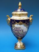 A cased Coalport vase hand painted with a scene of Edinburgh Castle monogrammed D.P.