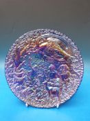 A Carnival glass plate in the 