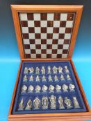 A Tudor Mint cased Lord of the Rings chess set