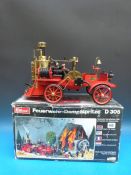 A Wilesco D305 fire engine with free way clutch (rear wheel drive, neutral and water pump),