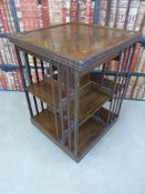 An oak revolving bookcase (53cm square,