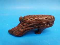 A 19thC carved mahogany snuff box in the form of a ladies shoe