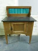 A marble topped and backed wash stand (W92, D43,