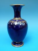 A Royal Worcester Kerr and Binns enamelled blue vase