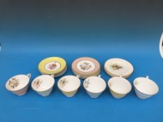 A Royal Worcester six-piece bone china harlequin set and three additional plates depicting birds,