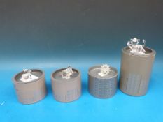 Four Swarovski crystal animals, a lion cub, a koala,