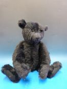 An Atlantic Bear black mohair bear with jointed limbs,