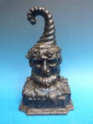 A 19th / 20thC figural cast iron doorstop