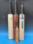 A collection of cricket bats including signed examples and a miniature example by Australian