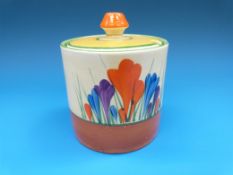 A Clarice Cliff lidded preserve pot decorated in the 