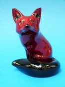 A Royal Doulton flambe fox (10.