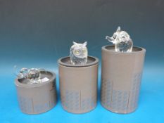 Two Swarovski crystal elephants and an owl (all in original boxes)