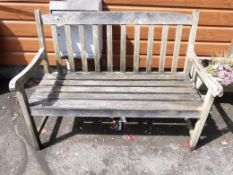 A teak garden bench