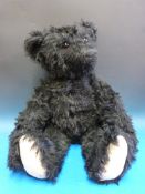 A large Steiff black mohair bear with growler (70cm tall)