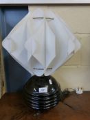 A 1920s Art Deco table lamp with ribbed globe shaped base