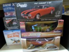 Ten large scale diecast model vehicles by American Muscle Models,