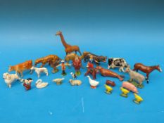 A collection of Britains, John Loo and other lead farm and zoo animals.