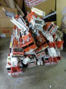 A collection of large scale model fire engines some by Tonka and some battery operated.